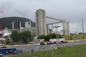 MPs Oppose Portland Cement Share Sale